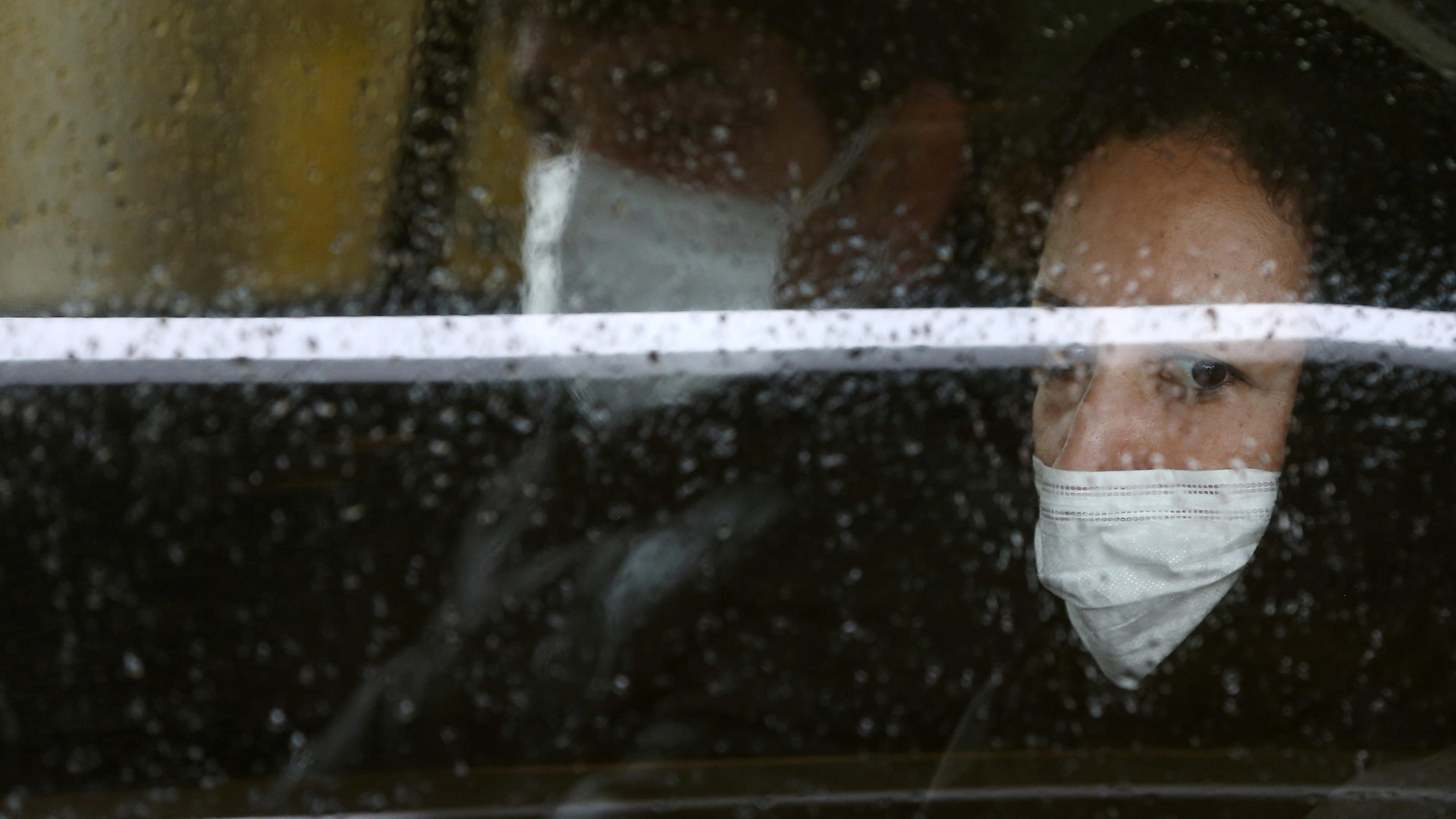 Coronavirus aus China: Chronik der bisherigen Ausbreitung - Teil 5 Menschen mit Schutzmasken in Teheran