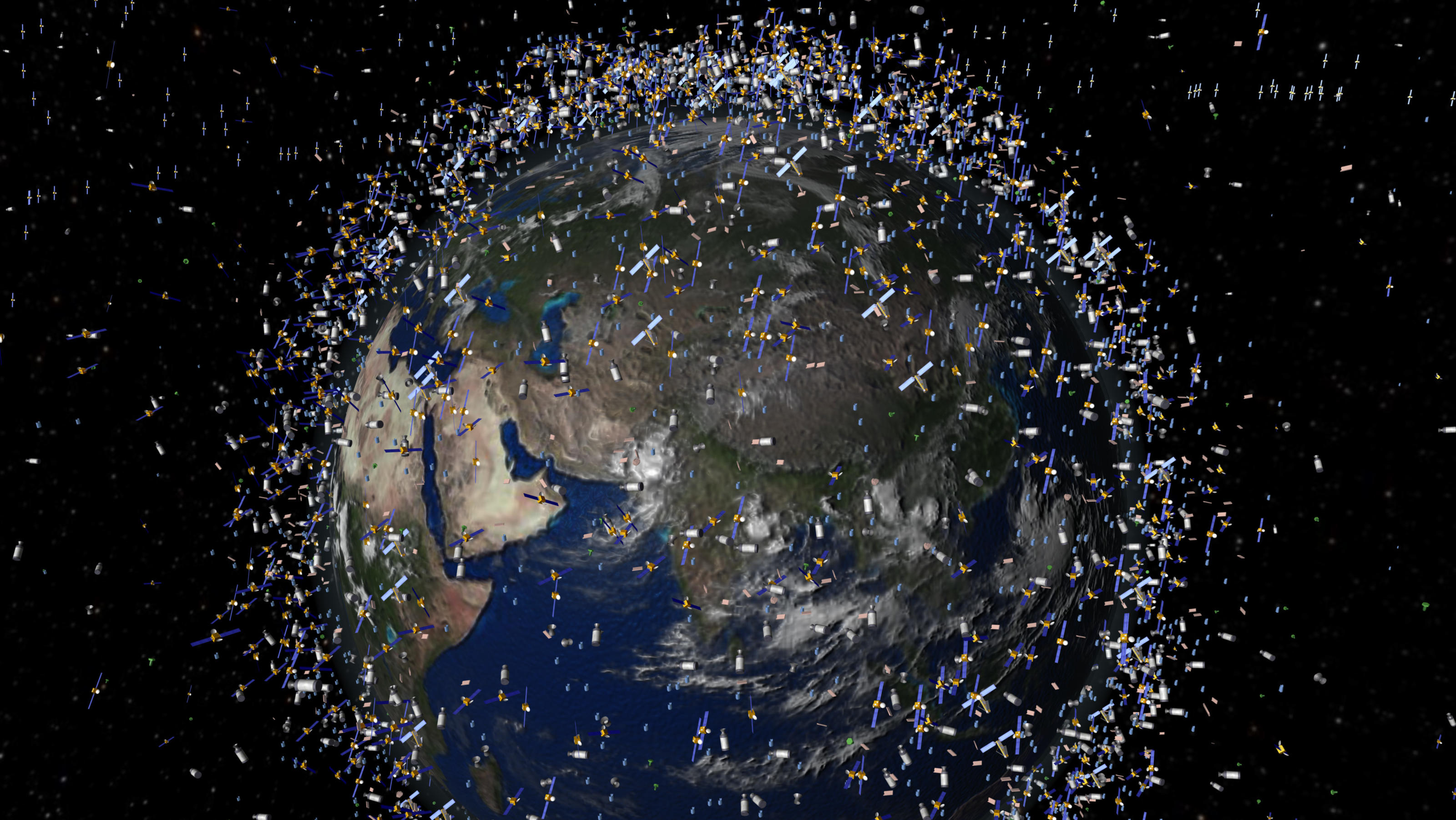 Weltraumschrott: Satellit und Raketenstufe fliegen aufeinander zu Die Zeichnung zeigt Weltraumschrott in der Erdumlaufbahn im sogenannten Low Earth Orbit (LEO), der bis 2000 Kilometer über der Erdoberfläche reicht (Blick über die Äquatorregion). Satelliten für Telekommunikation, Navigation und Wettervorhersage sind