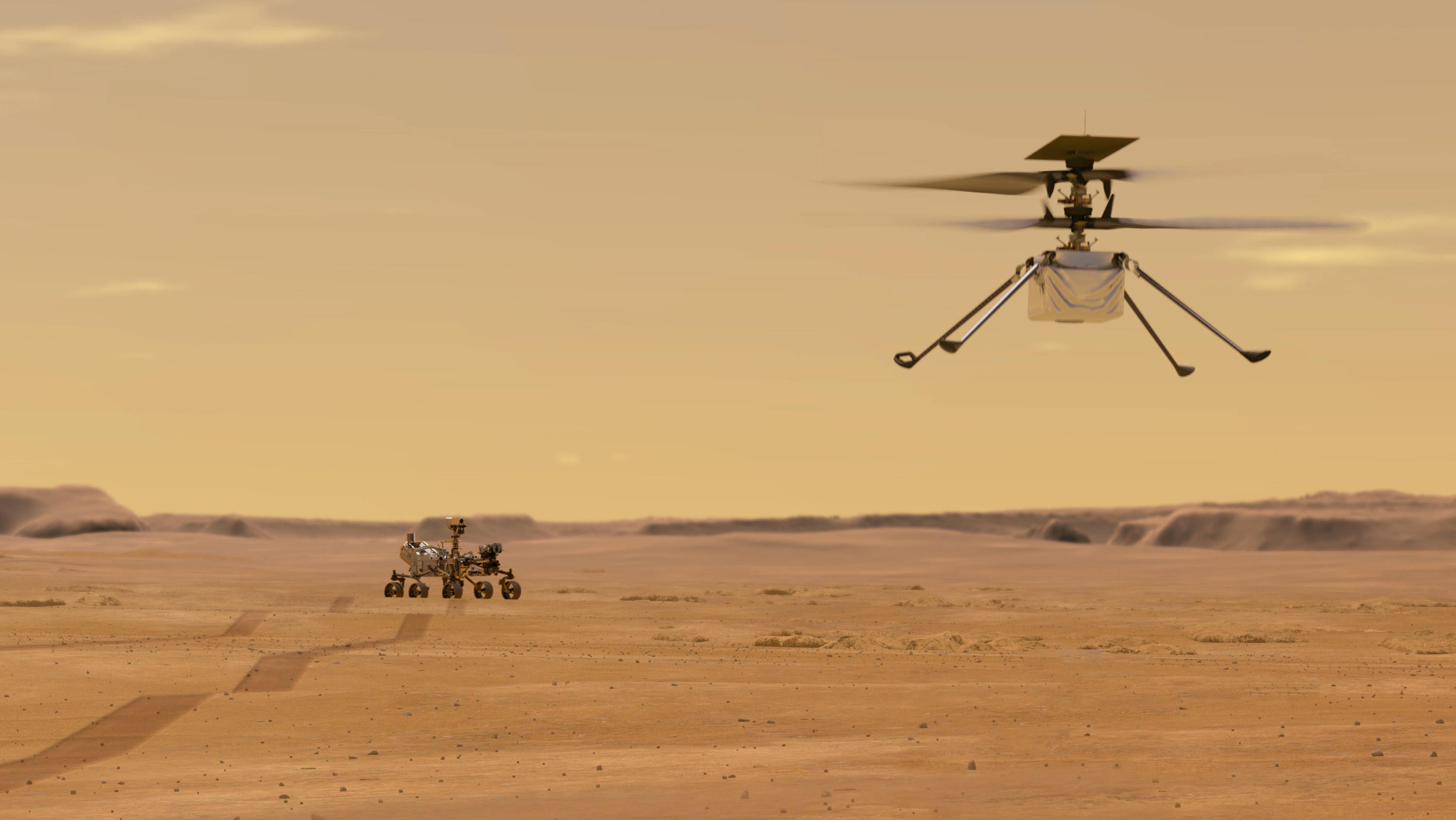 Nasas Ingenuity ist bereit für die Erkundung des Mars HANDOUT - 27.04.2020, ---: Die von der NASA zur Verfügung gestellte Illustration zeigt den «Ingenuity-Hubschrauber» (r) nach dem Start vom Nasa-Rover «Perseverance». Der Hubschrauber wird das erste Fluggerät sein, das einen kontrollierten Flug auf ei