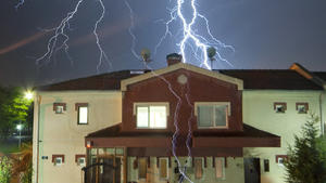 Sept. 22, 2011 - Eskisehir, turkey -  A suburban house is engulfed by lightning storms as they strike the Central Anatolia region in Turkey after a dry summer season