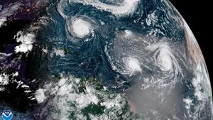 This NOAA GOES-16 True Color satellite image shows Hurricane Florence, left, in the Atlantic Ocean at 8:00 am EDT on September 11, 2018. Tropical Storm Isaac, center, and Hurricane Helene, right, are also seen as they move across the ocean. According to the National Hurricane Center, Florence, which could make landfall by Thursday, is expected to become a major hurricane very soon as it strengthens while moving across the Atlantic Ocean. NOAA/ PUBLICATIONxINxGERxSUIxAUTxHUNxONLY WAX2018091106 NOAA  