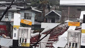 A damaged petrol station is seen as Typhoon Mangkhut hits Philippines, Laoag, Philippines September 15, 2018 in this still image obtained from a social media video.    PHILIPPINE RED CROSS/via REUTERS  ATTENTION EDITORS - THIS IMAGE HAS BEEN SUPPLIED BY A THIRD PARTY. MANDATORY CREDIT NO RESALES. NO ARCHIVES