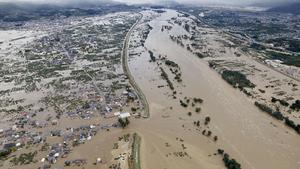  191013 -- NAGANO, Oct. 13, 2019 -- Aerial photo taken on Oct. 13, 2019 shows flooded river overflowing into residential areas in Nagano, Japan. At least four people have died, and around 100 people injured as of Sunday morning as Typhoon Hagibis ripped through Japan, including the Tokyo metropolitan area, leaving more than 250,000 households in Tokyo and nearby regions without power. Kyodo News via Xinhua JAPAN-TYPHOON-HAGIBIS-FLOOD MaxCaoran PUBLICATIONxNOTxINxCHN