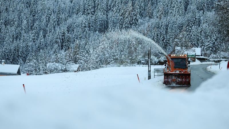 Snowplow is seen cleaning road in village of Winklern, Austria, November 14, 2019. REUTERS/Antonio Bronic