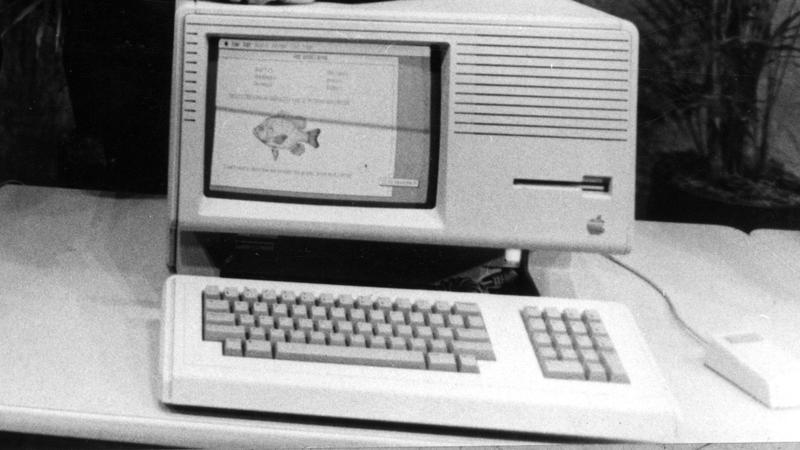  Apple Computer Chairman Steven P Jobs left and Apple President John Sculley prior to a shareholders meeting here in Cupertino , California . Jobs is standing behind a new Macintosh personal computer  Sculley is with the Lisa II personal computer the