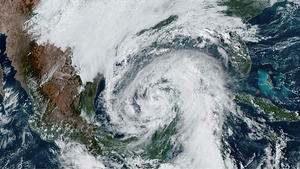 A satellite image shows Tropical Storm Hanna, which is expected to strengthen to a hurricane, in the Gulf of Mexico and approaching the coast of Louisiana, U.S., October 27, 2020.  NOAA/Handout via REUTERS  THIS IMAGE HAS BEEN SUPPLIED BY A THIRD PARTY.