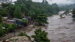  November 4, 2020, San Pedro Sula, Cortes, Honduras: A cluster of shanty homes along the overflowing riverbank of Rio Blanco during the aftermath..At least one death, 379 homes destroyed and more than 2,000 people evacuated in Honduras following Hurricane Eta that hit Nicaragua as a Category 4 and passed slowly over Honduras as a tropical storm. Its aftermath brought enormous amounts of rainfall that caused deadly flooding and mudslides throughout Central America. San Pedro Sula Honduras - ZUMAs197 20201104_zaa_s197_232 Copyright: xSethxSidneyxBerryx