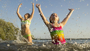 Kids playing and splashing water on a bay / lake / sea, during summer break (ISO 160). All my images have been processed in 16 Bits and transfer down to 8 before uploading.