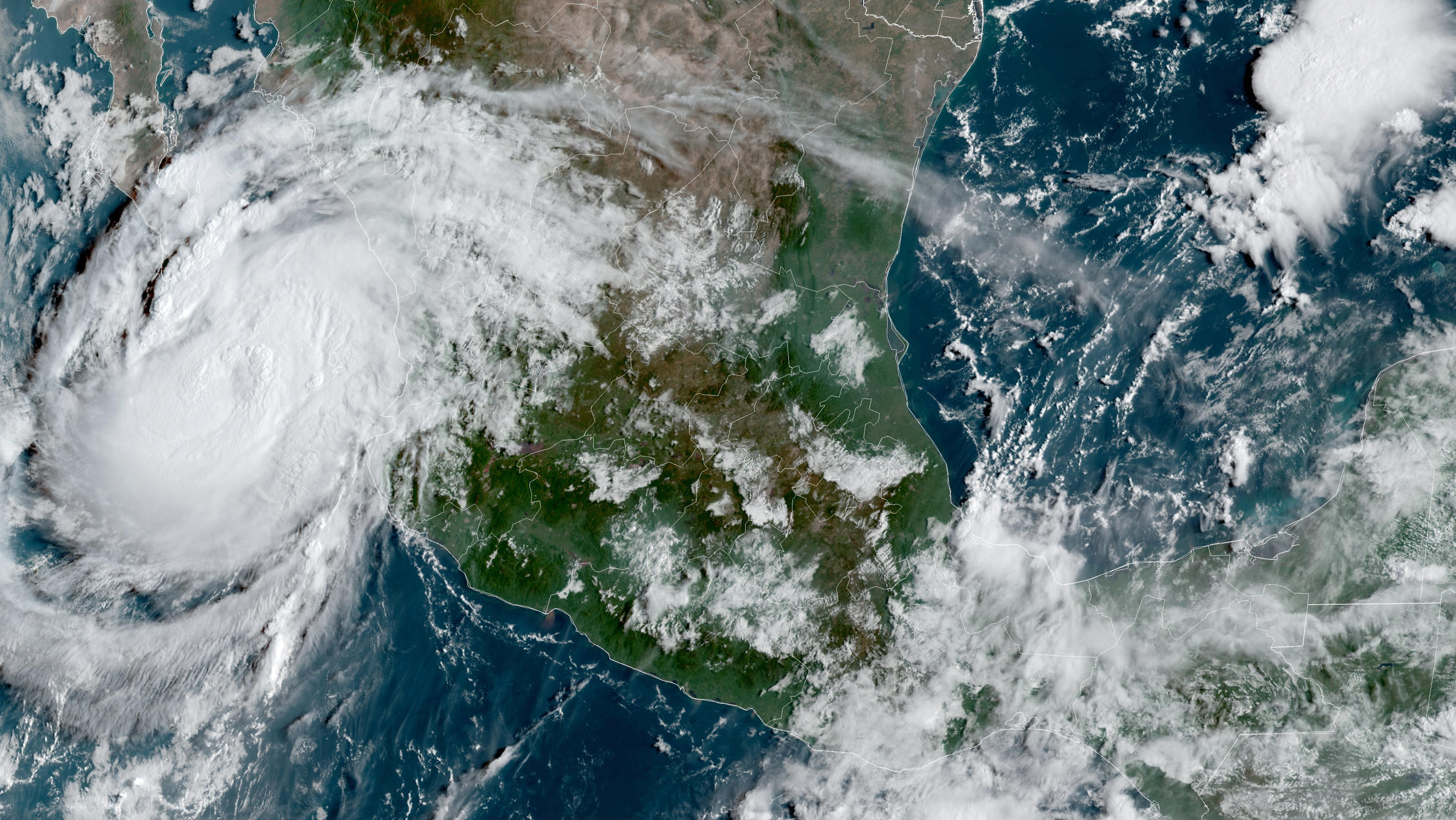 09.09.2021, Mexiko, ---: Dieses von der National Oceanic and Atmospheric Administration zur Verfügung gestellte Satellitenbild zeigt den Hurrikan Olaf an der Pazifikküste Mexikos, der sich der Ferienregion Los Cabos an der Spitze der Halbinsel Baja C