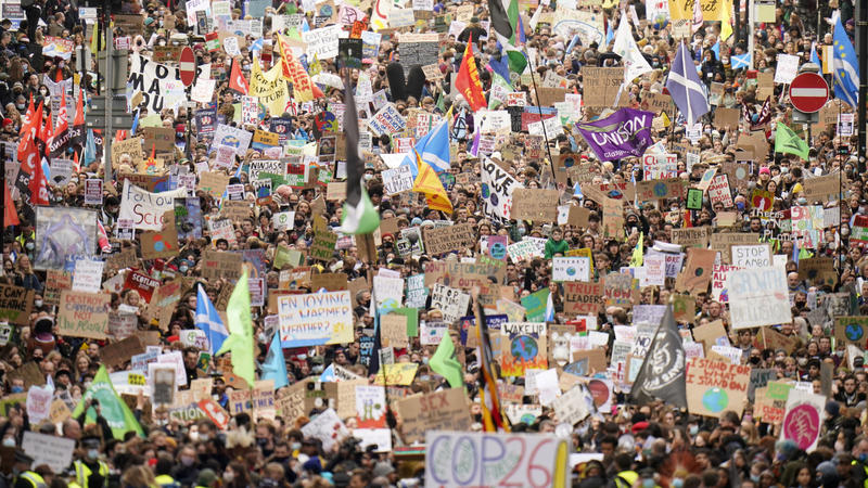 Climate activists march during a demonstration in the center of Glasgow, Scotland, Friday, Nov. 5, 2021, which is the host city of the COP26 U.N. Climate Summit. A protest is taking place as leaders and activists from around the world are gathering i