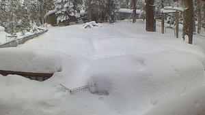 Snow is pictured at Lake Tahoe Residential backyard in this still image from a video in South Lake Tahoe, California, U.S. December 27, 2021. Picture taken December 27, 2021. K.C. Budd via Reuters  THIS IMAGE HAS BEEN SUPPLIED BY A THIRD PARTY. MANDATORY CREDIT NO RESALES. NO ARCHIVES