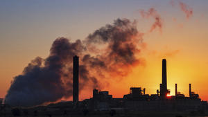 FILE - In this July 27, 2018, file photo, the Dave Johnson coal-fired power plant is silhouetted against the morning sun in Glenrock, Wyo. Jeremy Grantham, a British billionaire investor who's a major contributor to environmental causes, will fund carbon-capture research in Wyoming, the top U.S. coal-mining state. Wyoming's Republican governor, Mark Gordon, and the carbon-capture technology nonprofit Carbontech Labs announced Thursday, March 28, 2019, they're providing .25 million to help researchers find ways to turn greenhouse-gas emissions into valuable products. (AP Photo/J. David Ake, File)
