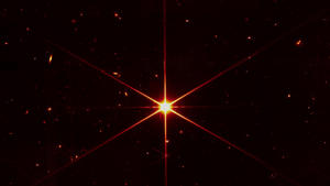 James-Webb-Teleskop blickt auf den Stern 2MASS J17554042+6551277 und die Galaxien drumherum