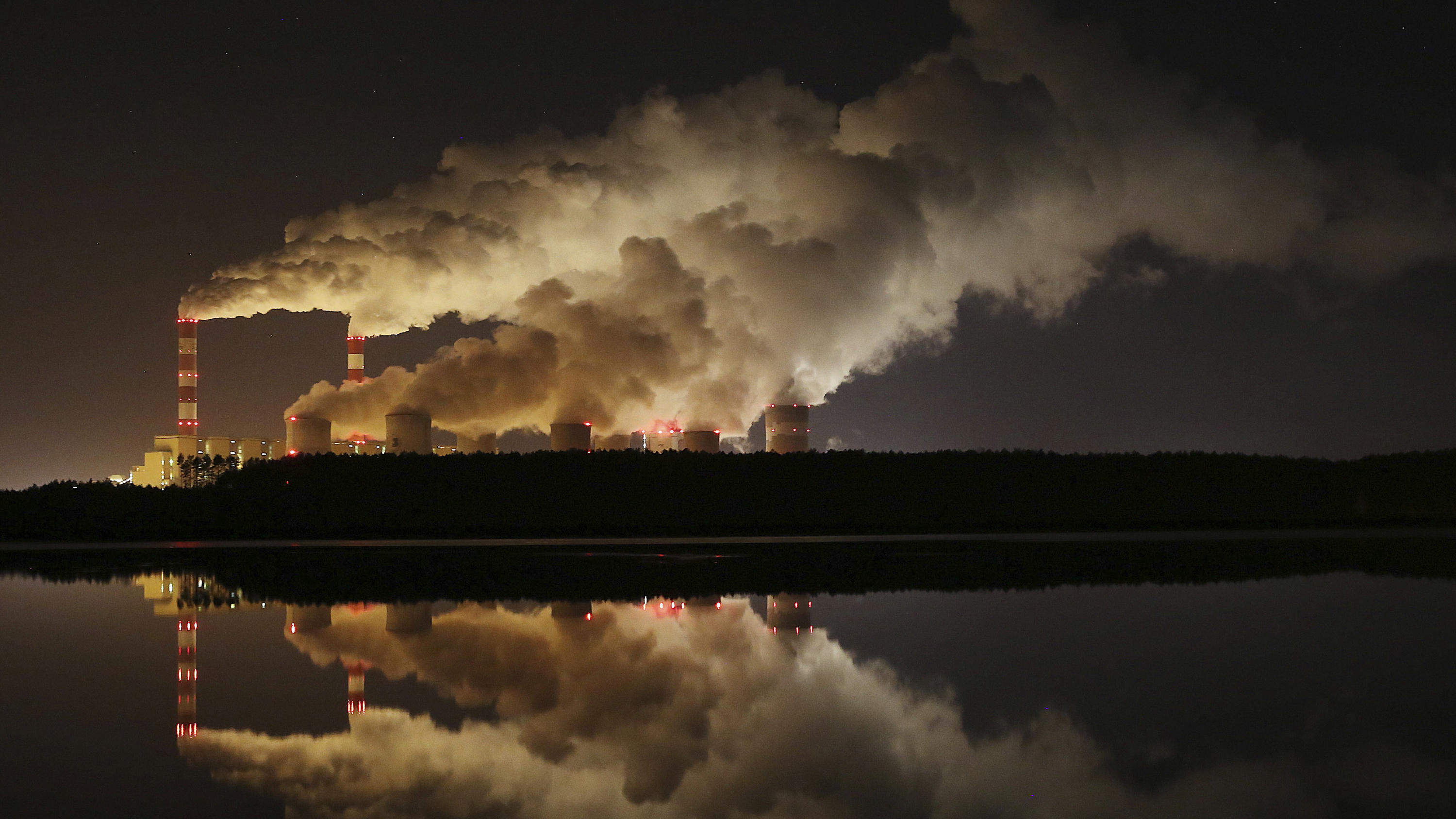 File-File photo shows clouds of smoke over Europe's largest lignite power plant in Belchatow, central Poland,