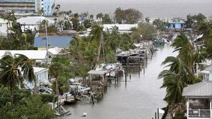 29.09.2022, USA, Fort Myers Beach: Häuser, Boote und Docks liegen nach Hurrikan «Ian» in Trümmern. Der Hurrikan «Ian» hat im US-Bundesstaat Florida enorme Schäden angerichtet. Foto: Douglas R. Clifford/Tampa Bay Times/AP/dpa - ACHTUNG: Nur zur redaktionellen Verwendung und nur mit vollständiger Nennung des vorstehenden Credits +++ dpa-Bildfunk +++