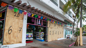 A store covered with wood sheets is pictured as Hurricane Roslyn approaches tourist zones along Mexico's Pacific coast, in Puerto Vallarta in Jalisco state, Mexico. October 22, 2022. REUTERS/Alfonso Lepe NO RESALES. NO ARCHIVES