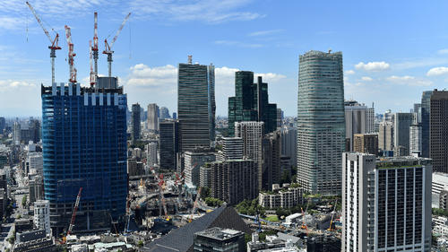 FILE PHOTO: Buildings under construction are seen in a general view from Tokyo Tower of the city of Tokyo, Japan, August 6, 2021. Picture taken August 6, 2021. REUTERS/Clodagh Kilcoyne/File Photo