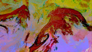 HANDOUT - Das Bild des Wettersatelliten METEOSAT von Mittwochmorgen (19.02.2014) zeigt aus 36.000 km Höhe Staub aus der Sahara, der bis nach Süddeutschland vorgedrungen ist. Zwar verdecken Wolken den freien Blick auf den Staub, eine Falschfarbendarstellung des Deutschen Wetterdienstes (DWD) ermöglicht jedoch eine Unterscheidung: In hell leuchtendem Rot ist Saharastaub zwischen Italien, Korsika, Sardinien und Nordafrika zu erkennen. Hohe Wolken erscheinen dagegen dunkelrot bis schwarz, tiefe Wolken grün-gelblichlich. Foto: Deutscher Wetterdienst (DWD) /dpa  - ACHTUNG: Nur zur redaktionellen Verwendung bei Nennung der Quelle - (zu dpa "Saharastaub regnet vom Himmel über Südbayern" vom 19.02.2014) +++(c) dpa - Bildfunk+++