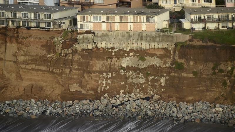 Uninhabitable apartments, in danger of collapsing into the Pacific Ocean, line Esplanade Ave. in Pacifica, California January 26, 2016. The city has marked three apartment complexes uninhabitable as El Nino storm erosion eats away at the coastal bluf