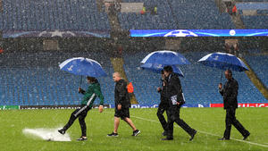 MANCHESTER, ENGLAND - SEPTEMBER 13:  Referee Bjorn Kuipers assesses the waterlogged pitch prior to the UEFA Champions League Group A match between Manchester City FC and VfL Borussia Moenchengladbach at Etihad Stadium on September 13, 2016 in Manchester, England.  (Photo by Alex Livesey/Bongarts/Getty Images)