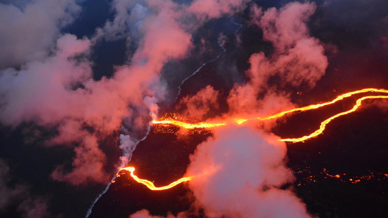Lava flows are seen entering the sea along the coastline during ongoing eruptions of the Kilauea Volcano in Hawaii, U.S. May 23, 2018.   Picture taken on May 23, 2018.    USGS/J. Ozbolt, Hilo Civil Air Patrol/Handout via REUTERS     ATTENTION EDITORS