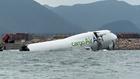 Flugzeug-Unfall am Hongkonger Flughafen: Boeing 747 rutscht von Landebahn ins Meer